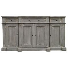 the sideboard has four drawers and two doors