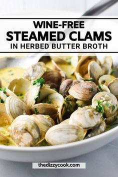 a white bowl filled with clams and garnished with parsley on top