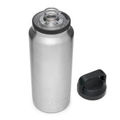 a stainless steel water bottle next to a black lid