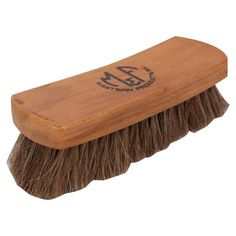 a wooden brush with brown bristles on the top and black logo on the bottom