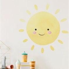 there is a wall sticker with a sun on it