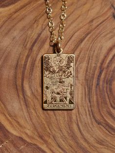 "Copy and paste into your browser, get 15% off ➔ https://bit.ly/VD15OFF Gold Judgement Tarot Card Necklace DETAILS: -One necklace -18mm x 10mm Gold Filled Charm -Gold Filled chain in the length of your choice -Spring ring clasp You will receive one gold filled tarot card charm necklace, in the length of your choice. **Every item is handmade, this means that each will be unique and may not look EXACTLY like the picture, but it will look very similar ➡ORDER PROBLEMS If there are any problems with Judgement Tarot, Judgement Tarot Card, Mystic Jewelry, Tarot Card Necklace, Best Friend Birthday Gift, Witch Necklace, Card Necklace, Mystical Jewelry, Friend Birthday Gift