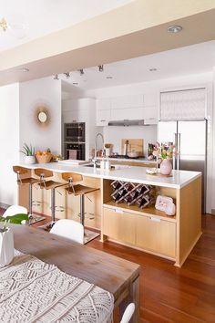 the kitchen is clean and ready to be used as a dining room or living room