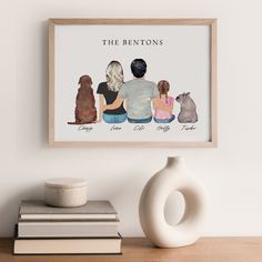 a family photo hanging on the wall next to books and a vase with an animal figurine