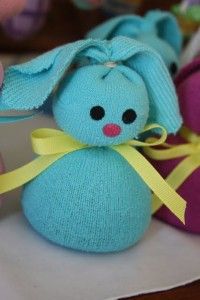 a blue stuffed animal sitting on top of a table