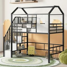 a child's bedroom with a loft bed and stairs