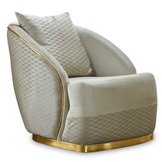 a white chair with gold trim around the arm and back, sitting in front of a white background