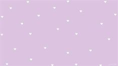 a purple background with white hearts on it