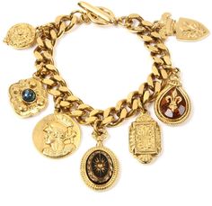 a gold bracelet with various charms on it