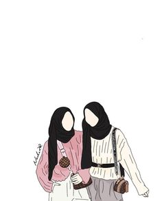 two women in hijabs are looking at something