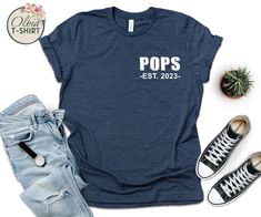 Custom Pops Est 2024 Shirt, New Pops Gift, Personalized Pops Shirt, Father's Day Gift, Pops Est Custom Year T-shirt, Pops Grandpa T-shirt We want to make everyone smile with our cute , stylish and trendy graphic T-shirts. We can assure you this shirt will be perfect gift  whether you will buy it yourself or for someone else. ATTENTION PLEASE   Black design for White, Yellow, Athletic Heather, Orange, Pink, Baby Blue, Mint, Natural , Desert Pink, Banana Cream, Cancun and Heather Peach. White desi I Be Popping Bottles Shirt, Father's Day Cotton Fan Merchandise T-shirt, Pops Shirt Grandpa, Father's Day Fan Apparel T-shirt With Short Sleeve, Father's Day Customizable Graphic T-shirt, Pop Pop Shirts, T Shirt Png, Banana Cream, Black Design