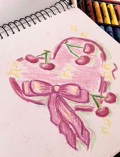 a drawing of a heart with cherries on it and a bow around its neck