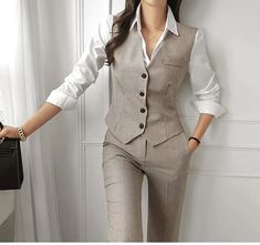 This Three Piece Ladies Career Suit is a must-have for every ambitious woman. Crafted from high quality fabric, this smart double-breasted design is both elegant and professional, complete with a matching inner vest and pants. Look your best and conquer the world. Fast and free shipping in the United States! Item will arrive within 3-5 days. Chic Business Outfits, Formal Suits For Women, Long Sleeve Suit, Vintage Suit, Women Blazer, Woman Suit Fashion, Vintage Long Sleeve, Blazer Set, Stylish Work Outfits