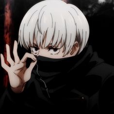 an anime character with white hair and black clothes holding his hand up to his face