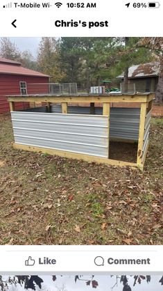 a chicken coop built into the side of a house with an attached door and roof