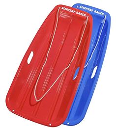 two red and blue plastic sleds sitting next to each other