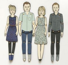 three paper dolls standing next to each other in front of a white background with the cut out people