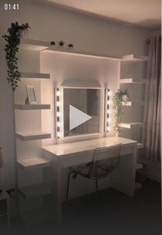 a white desk topped with a mirror and lights