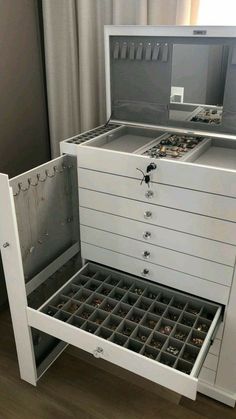 the drawers are open and there is no one in them on the table or floor