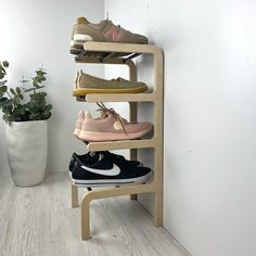 Tired of shoes spilling out all over your floor? This wood and metal shoe rack for entryway can help. Instantly create more space with its 4 tier of shoe storage, so you'll never trip over a rogue sneaker again! So take the hassle out of shoe storage, and say hello to effortless organization. DIMENSIONS: 4 tier shoe stand will work for 5 pairs of shoes Height: 24 inches (61 cm) Length: 11 inches (28 cm) Depth: 11 inches (28 cm) Distance between tiers: 6 inches (15 cm) PRODUCT MATERIAL: - Birch p Wall Mounted Shoe Organizer, Small Vertical Shoe Rack, Wall Shoe Storage, Spinning Shoe Rack, Wooden Shoe Rack, Vertical Shoe Rack, Shoes Organizer, Shoe Stand, Metal Shoe Rack