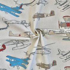 the fabric has airplanes on it