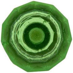 an image of a green object that looks like it is looking into the camera lens