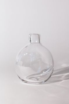 FRAMA-Clear-Round-Glass-Bottle-Shop-Sommer Serving Pitchers & Carafes, Clear Vase, Round Vase, Glass Carafe, Clear Glass Vases, Circle Shape, Glass Cup, Cut Flowers, Glass Bottle