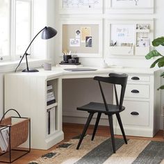 a chair sitting in front of a white desk