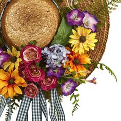 a straw hat with colorful flowers on it