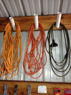 there are many different types of cords hanging on the wall