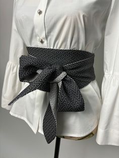 Double sided wide belt in black and black with white. The belt is suitable for long and medium length shirts, dresses and tunics. Goes great with a skirt or pants. It is made in several sizes. Size is determined by waist circumference. A great addition to your look. We produce quality garments for sustainable fashion.  Join our audience for special discounts with promo codes.  Copy the link below into your browser and confirm your subscription from the email you will receive.  https://mailchi.mp Black Fabric Belt For Summer, Chic Black Belts For Spring, Spring Black Belted Corset Belt, Black Corset Belt For Spring, White Fabric Belt For Summer, Cloth Belt, Belt For Women, Obi Belt, Wrap Belt