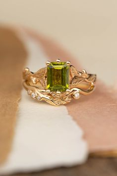 a green ring sitting on top of a table