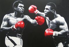 two men standing next to each other in front of a large painting of boxing gloves