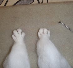 a pair of feet that are on the ground