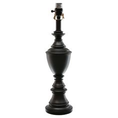 a black candle holder on a white background