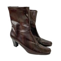 "Vintage 1990s dark brown faux leather boots. The slim, fitted boots feature seams down the front, square toes, high heels, inner side zippers, and hit around the mid calf. They look perfect with cropped or bootcut jeans!  Brand: A2 Material: man made material  Size: 8.5 Measurements:  Insole: approximately 10.25\" Width: 3.25\"  Heel: 2.75\" Calf width: 5.5\" (11\" circumference)  Condition: Great vintage condition with inky minimal wear!  Follow us on Instagram @missdorothyvintage for previews Fitted Boots, 80s Boots, Boots Y2k, 90s Boots, Boots Mid Calf, Dark Brown Boots, High Heeled Boots, Boots Square Toe, Faux Leather Boots