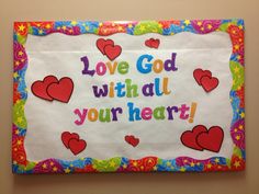 a bulletin board with hearts on it and the words, love god will your heart