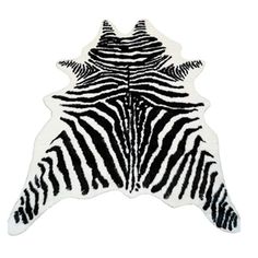 a zebra print rug with black and white stripes