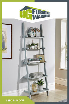 a ladder leaning up against a wall in a living room with the words big furniture warehouse on it