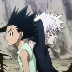 two anime characters standing next to each other in front of some rocks and trees with black hair