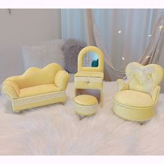 the furniture is all yellow and has white fur around it's edges, along with a mirror