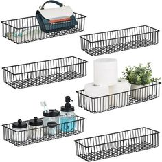 four metal baskets holding toiletries and cleaning supplies, one with a tissue dispenser