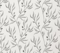 a white wallpaper with green leaves on it