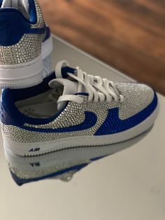 Be a beacon of style and glamour with these custom Silver Rhinestones Air Force 1 Wedding Sneakers! Perfectly embellished for a look that will turn heads, these sleek shoes will give you confidence to take on any challenge or day. Rock the night away and shine with protection from the forces in style! 💎 🔥 100% genuine, Brand New.👟 Custom sneakers.💫 Every pair is hand-made to order.✨ Best quality waterproof and scratch-proof paints used.✨ 1000+ satisfied customers across various platforms. 🌎 Air Force 1 Wedding, Sleek Shoes, Swarovski Nike, Bedazzled Shoes, Homecoming Shoes, Boty Nike, Shoes For School, Wedding Sneakers, Pretty Shoes Sneakers