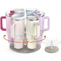 three mugs with handles are shown next to each other and the measurements indicate that they have been placed on top of each other