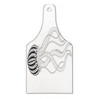 a white cutting board with a black and white design on it