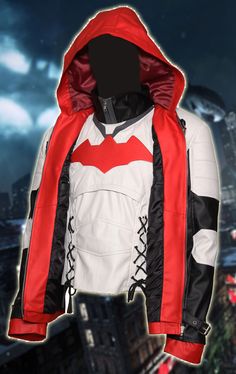 a red and white jacket with the batman symbol on it's chest, in front of a cityscape