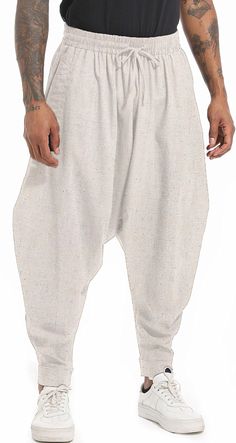 PRICES MAY VARY. Unique desgin,Casual Loose fit , high-quality cotton fabric offered by these Harem pants which delivers all-day comfort for you while looking stylish. This leisure hippie harem pants featuring with elastic waist with adjustable drawstring for maximum comfort, crotch design for ease of movement. These aladdin harem pants feature with 2 side pockets, The drop crotch design of these wide leg pants adds a trendy and relaxed look. The hippie aladdin harem pants perfects for your dail Affordable Khaki Cotton Harem Pants, Casual White Harem Pants, Mens Harem Pants, Hippie Trousers, Harem Trousers, Coffee Dates, Pants Loose, Aladdin, Daily Life