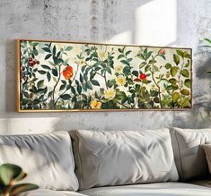 a painting hanging on the wall above a couch