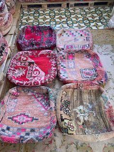 colorful rugs are laid out on the floor